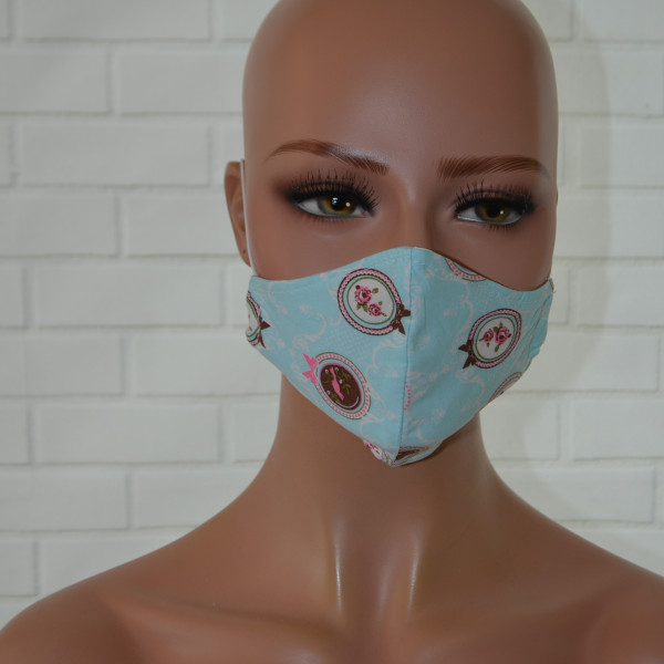 Mondkapje of gezichtsmasker licht blauw met medaillons