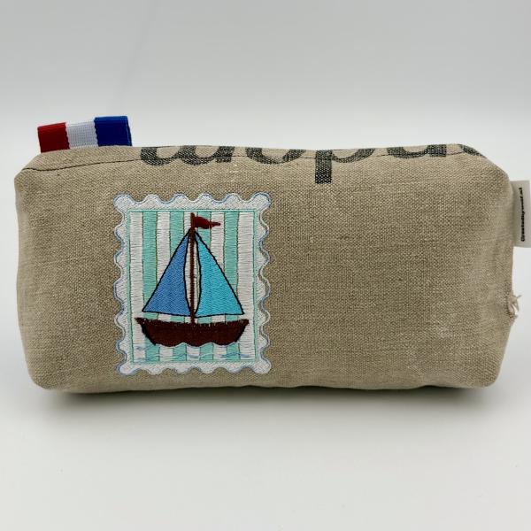 Toilettas van ptt postzak postzegel zeilboot