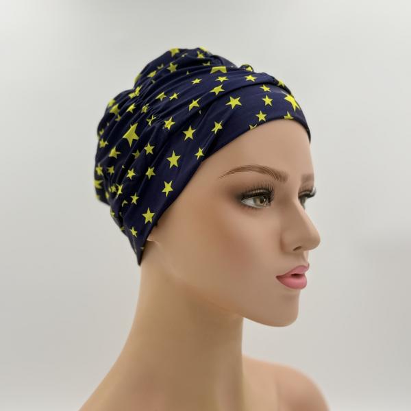 Badmuts chemomuts blauw met gele sterren one size