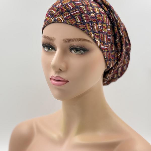 Handgemaakte chemo muts Bonnie paars, rood, bruin en groen met gouden stip maat S