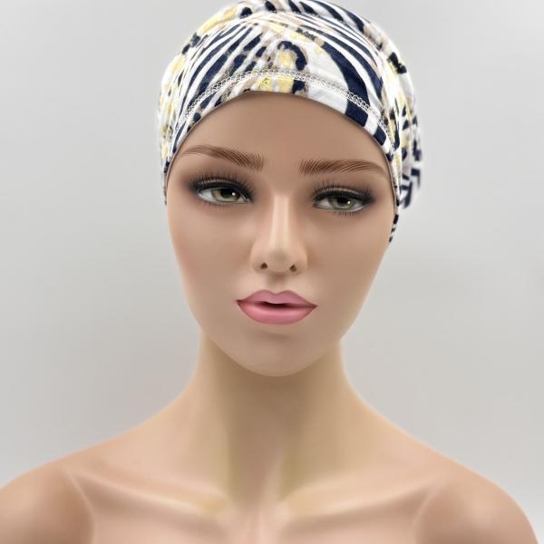 Handgemaakte chemo muts Babet wit met zebra blauw en geel maat S