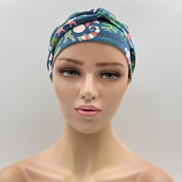 Handgemaakte chemo muts Buffy petrol met figuren en roze met bloemen maat M