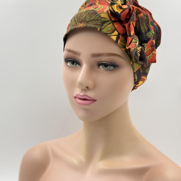 Handgemaakte chemo muts Beyonce in retro kleuren oranje, geel, groen en bruin maat M