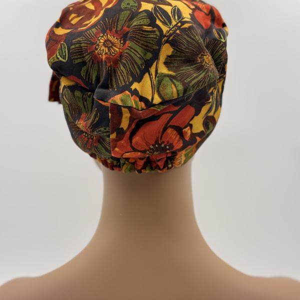 Handgemaakte chemo muts Beyonce in retro kleuren oranje, geel, groen en bruin maat M