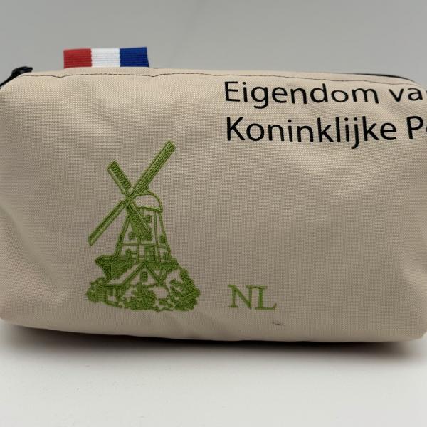 Toilettas van ptt postzak postzegel palmboom