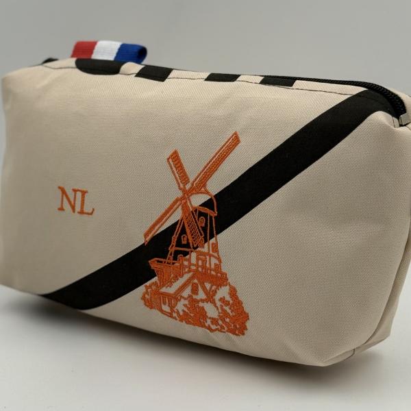 Toilettas van ptt postzak postzegel palmboom